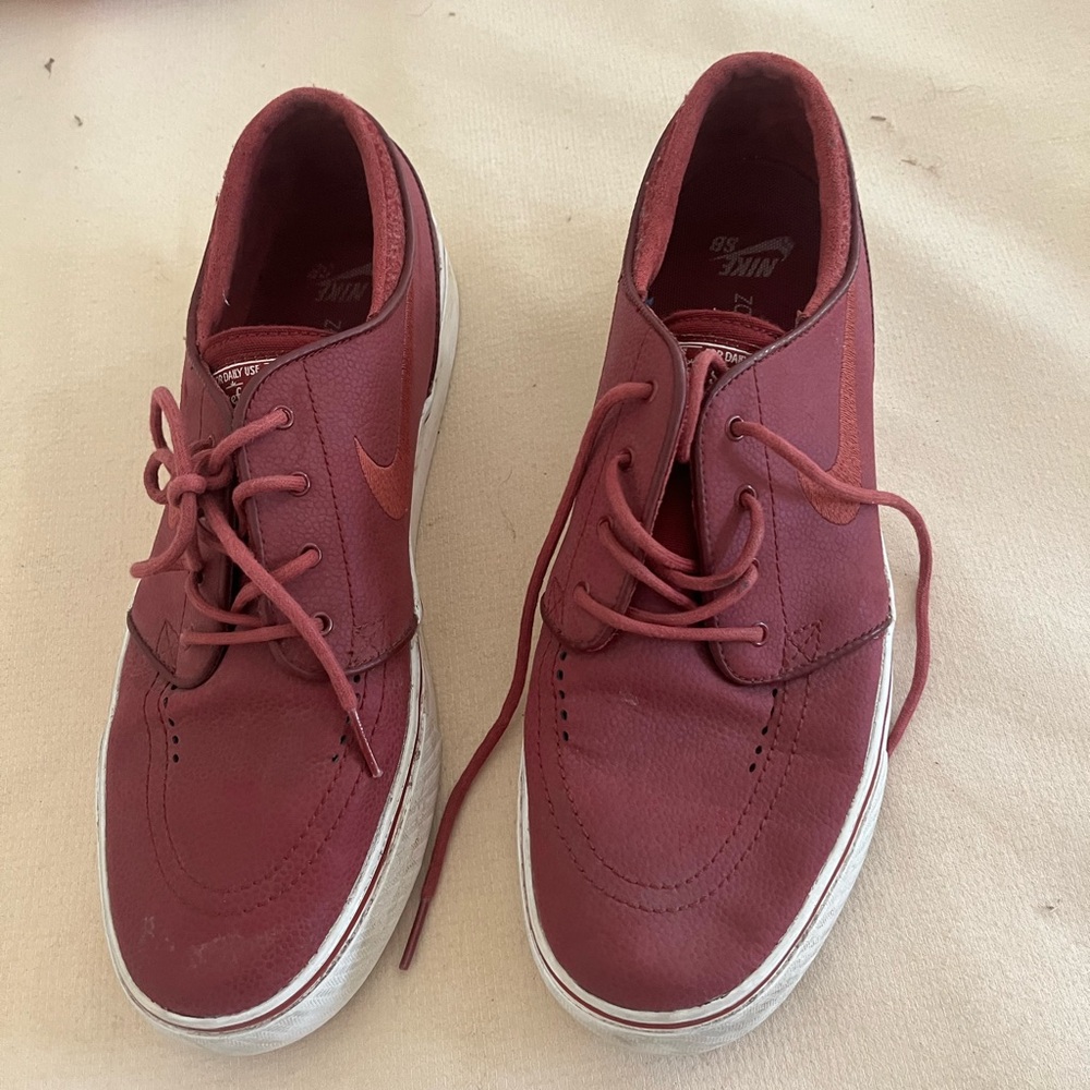 Nike Red Sneakers with Sleek Design